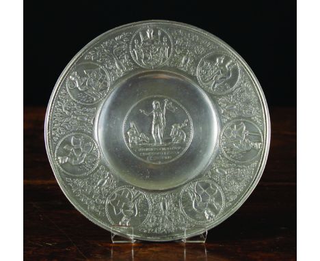 A Copy of The Resurrection Plate cast with Christ Risen to the centre medallion above inscription, and seven figures bearing 