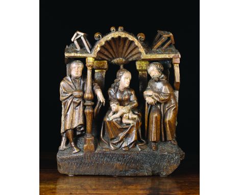 A 16th Century Flemish Retable Carving with traces of polychrome. Depicting The Nativity with Mary and the Baby Jesus to the 