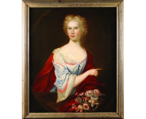 English Provincial School, Circa 1700. Oil on Canvas: Half Length Portrait of a fair-haired Lady painted in a feigned oval. T