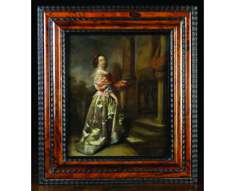 An Oil on Oak Panel: Full Length Portrait of 17th Century Lady dressed in finery holding a basket of Oranges. The panel with 