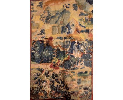 An Early 18th Century Tapestry Fragment (A/F) depicting a bird in wooded landscape with clump of flowers in the foreground, 6