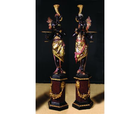 A Pair of Fine 19th Century Carved & Polychromed Venetian Figural Torchères. The male and female Blackamores dressed in elabo