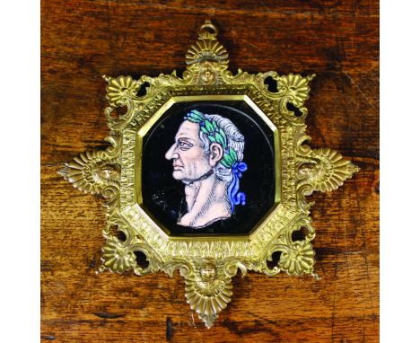 A 17th Century Limoges Portrait Medallion attributed to the workshop of Jacques Laudin II. The enamelled roundel depicting Ca
