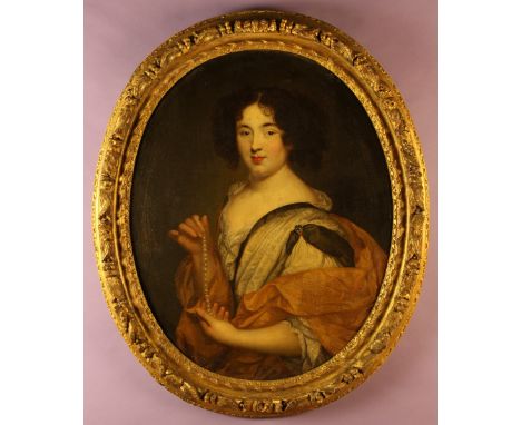 A 17th Century Oval Oil on Canvas: Portrait of a Young Lady dressed in finery and holding a string of pearls, 32 ins x 25½ in