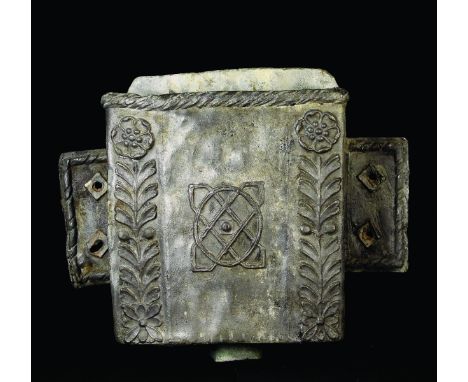 A 17th Century Lead Hopper. The rectangular cistern having a rope twist edge with an interlaced motif to the centre and flowe