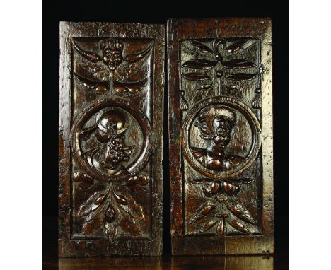 A Pair of Fine 16th Century Oak Romayne Panels, Circa 1540, possibly English. The richly patinated panels carved with portrai