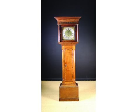 A Late 18th Century Oak Longcase Clock. The eight day movement having a 12 inch (30.5 cm) square brass dial signed Courtier R