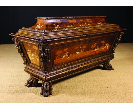 A 19th Century South German/North Italian Ivory Inlaid & Fruitwood Marquetry Cassonne. The large sarcophagus-shaped chest wit