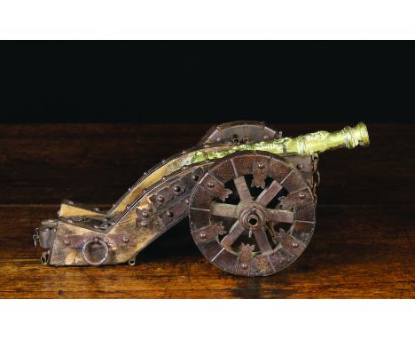 A 19th/Early 20th Century Scale Model of a 17th Century French Field cannon. The brass barrel with relief cast decoration 7½ 