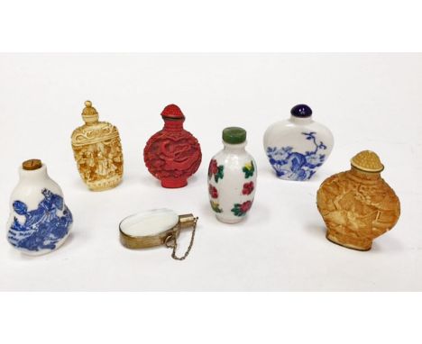 COLLECTION OF SEVEN CHINESE SNUFF BOTTLES
comprising three ceramic examples, three ivorine and one mother of pearl, the talle