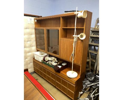 Teak wall unit and a lamp