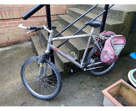 A silver coloured Saracen mountain bike