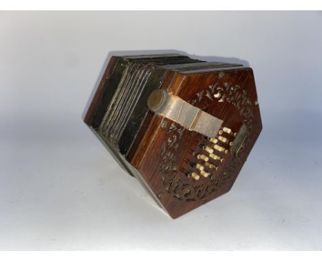 A 19th/20th Century concertina accordion, with fretwork sides