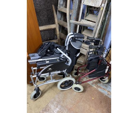 An Orbit folding wheel chair and a walking aid