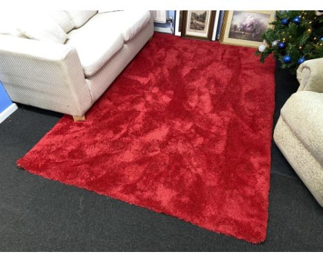 A red woollen rug