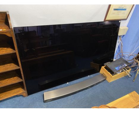 A wall mounted LG OLED77C9PLA television, 77" screen, cost £4,999