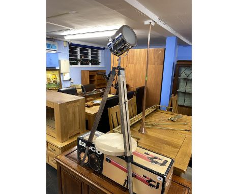 An industrial style tripod spot lamp, measuring 108cm H and a boxed Tasco telescope