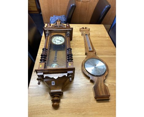 A walnut cased Vienna wall clock, 96cm H and a mahogany inlaid barometer