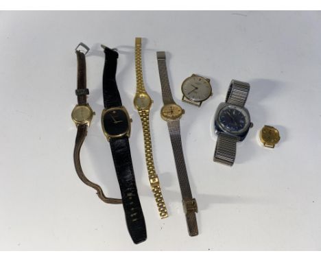 A bag of various vintage wristwatches and watch faces