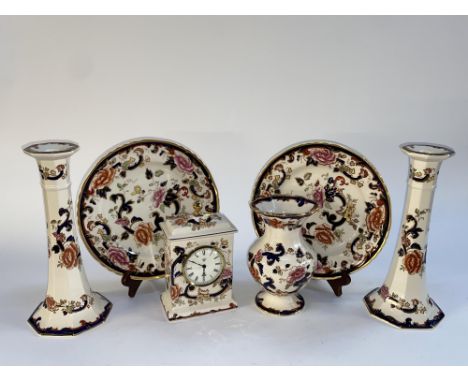 A selection of Masons Mandalay patterned tableware, including a pair of candlesticks and time piece