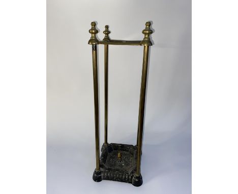 A Victorian brass and cast iron stick stand, measuring 67cm H