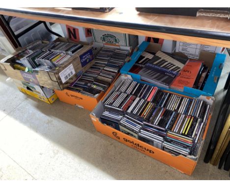 Four boxes of CDs and one of Classical Music booklets