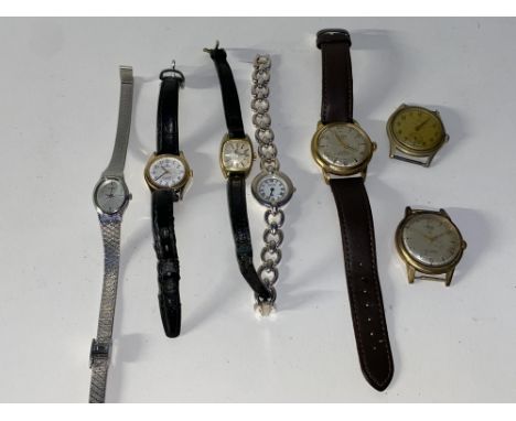 An assorted collection of vintage wristwatches and faces including Sekonda and Avia