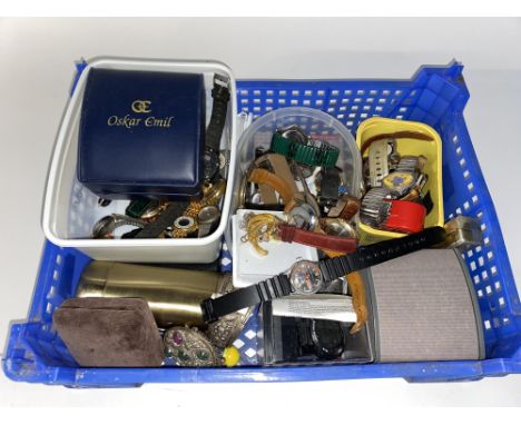 A tray of various vintage wristwatches, including a Mr Men watch, white metal bangle and brooch, plus gold coloured brooches