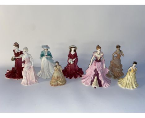 Eight Coalport porcelain figural ornaments depicting ladies, the largest measures 23cm H