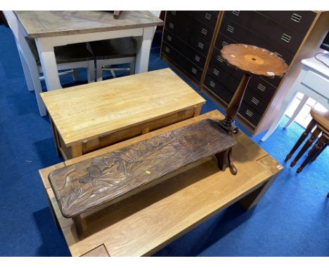 A carved foot stool and an inlaid wine table