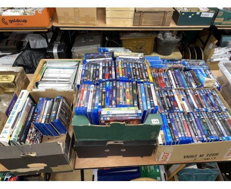 Four boxes of DVDs, plus two boxes of Newcastle United Football programmes and books