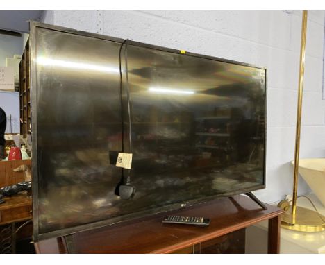 An LG 43" flat screen television, with remote