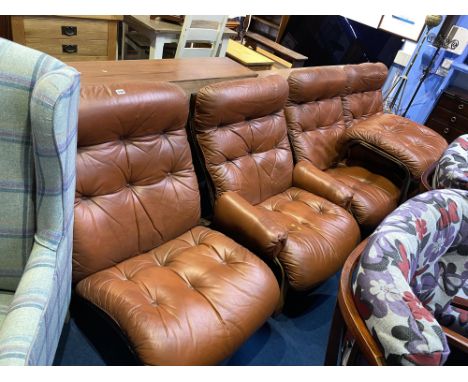 A set of four Norwegian bentwood tan leather button back chairs comprising; two armchairs and two single chairs, matching foo