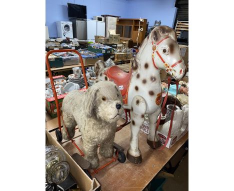 A 1940s mohair ride on puppy dog and a 1940s Mobo Bronco metal ride on toy horse