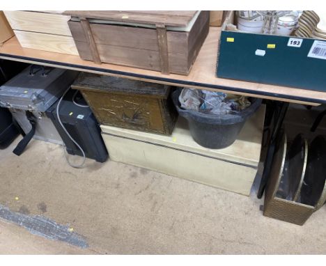 An embossed brass log box, magazine rack, amp and various cases