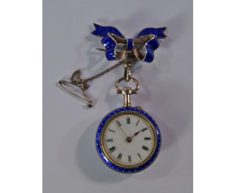 An early 20th century silver gilt and enamel ladies fob watch, the reverse with enamelled scene of a courting couple, approx.