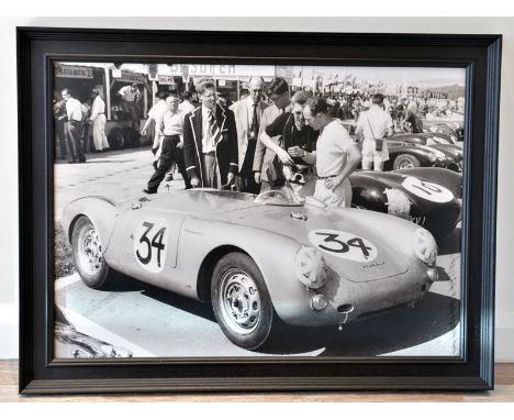 Stirling in the Paddock at Goodwood'A large format true-photographic monochrome print depicting Stirling Moss with his Porsch