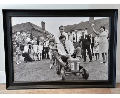 Party at Graham's House'A large format true-photographic monochrome print depicting a Garden Party at the home of Graham Hill