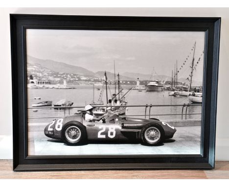 Moss in Monte Carlo'A large format true-photographic monochrome print depicting Stirling Moss behind the wheel of a Maserati 
