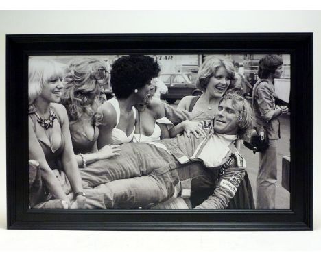 James Hunt and the Grid Girls'A large format true-photographic monochrome print depicting the World Champion racing driver in