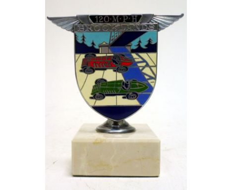 A Brooklands '120 MPH' Enamel Car BadgeChrome-plated with 8-colour enamelled design of two racing cars on the Member's Bankin