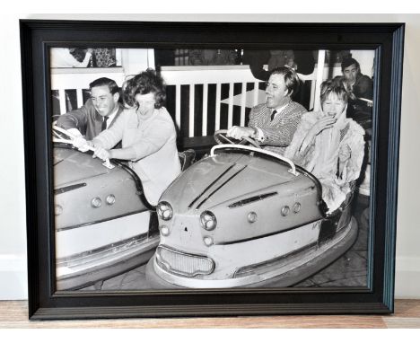 Formula One is a Non-Contact Sport'A large format true-photographic monochrome print depicting the Team Lotus teammates Graha