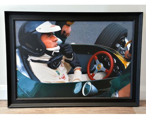 Jim Clark in the Lotus 49'A large format true-photographic colour print depicting the World Champion racing driver behind the