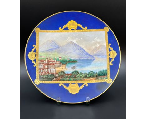 KPM Berlin. Antiker Wandteller. Blick auf Lugano.Circa 30 cm im Durchmesser. Porzellan. Unterglasurblaue Zeptermarke. Polychr