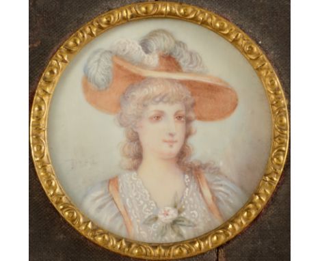 Miniature portrait of a fashionable lady Indistinctly signed 4cm diameter