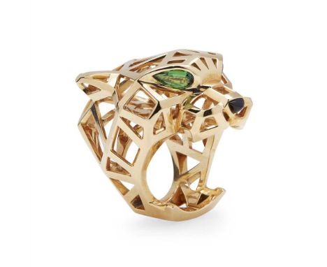 An 18ct gold Panthère de Cartier gem set ring, Cartier modelled as a leopard's head, of stylized geometric sculptural form, t