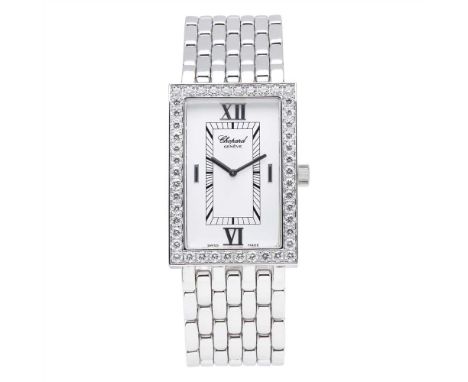 An 18ct white gold and diamond set wristwatch, Chopard Les Classique, white rectangular dial with baton indicators and Roman 