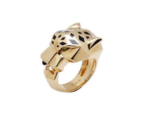An 18ct gold Panthère de Cartier gem set ring, Cartier modelled as a leopards head, with black lacquer detail, the eyes model