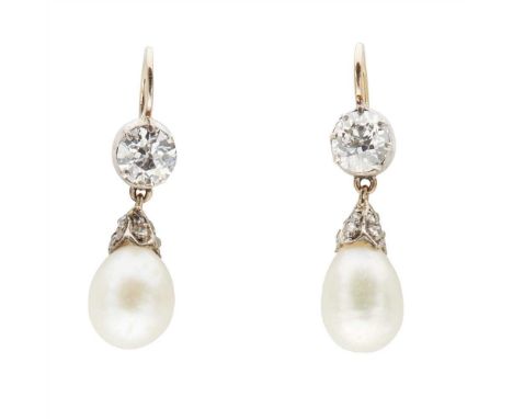 A pair of diamond and natural pearl set pendant earrings each claw set with an old round cut diamond, suspending a drop shape