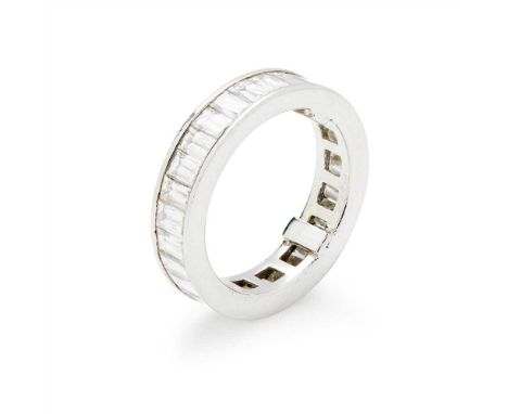 A diamond set eternity ring channel set with a continuous row of Prince-cut diamonds, stamped 950 (Dimensions: Ring size: J/K